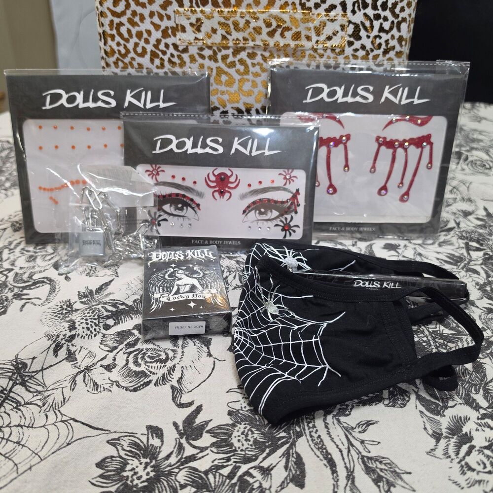Dolls Kill Bundle of 8 Face Gems Eyeliner Playing Cards Lock Necklace and Masks